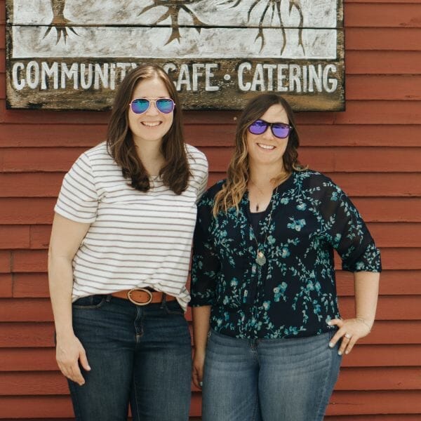 Trebletree Co-Founders Lauren Busby and Megan Michelakos stand in front of a local cafe in New Hampshire